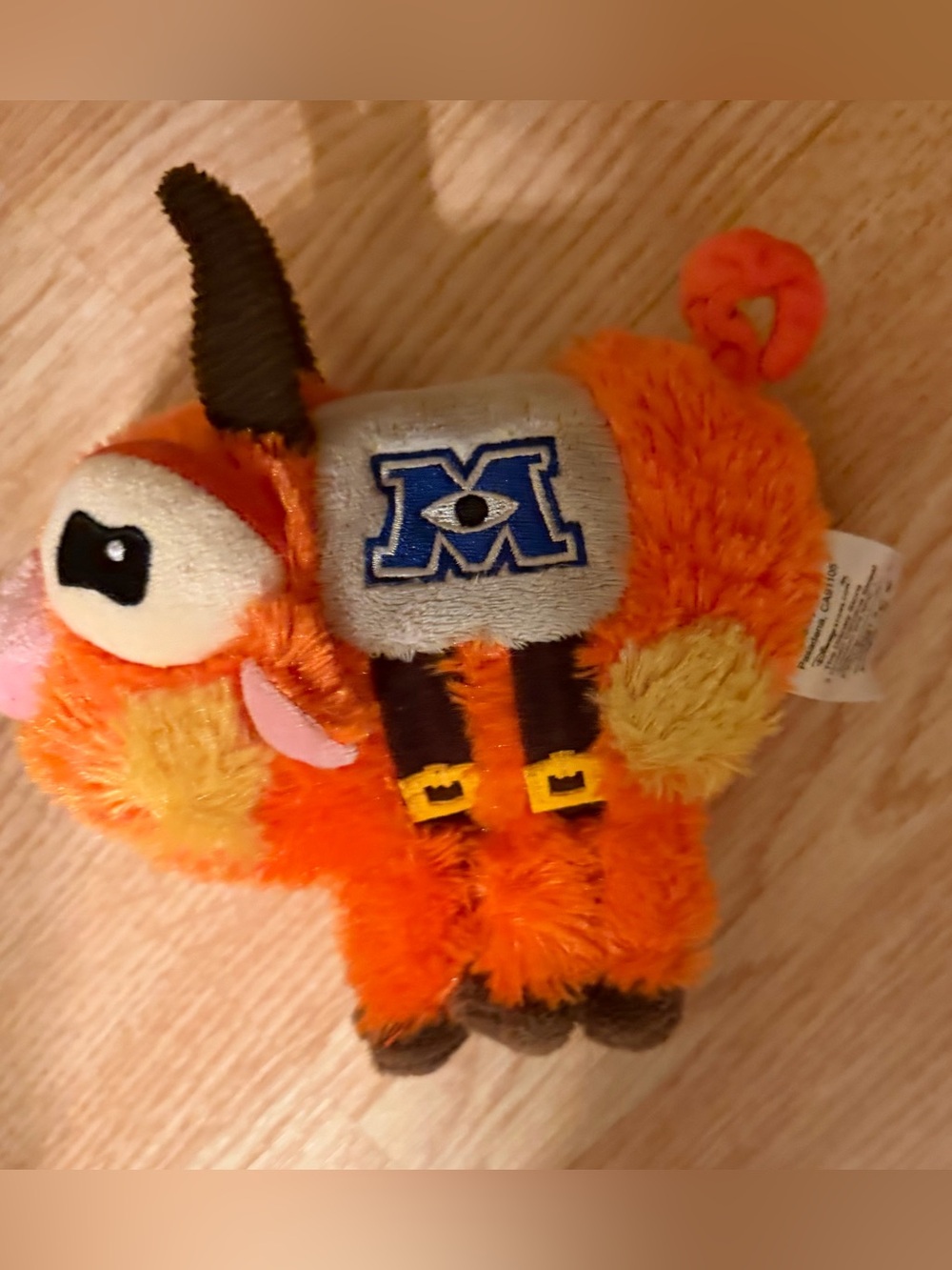 Disney Store Monsters Inc
University Archie Scare Pig
Orange Stuffed Plush 6”